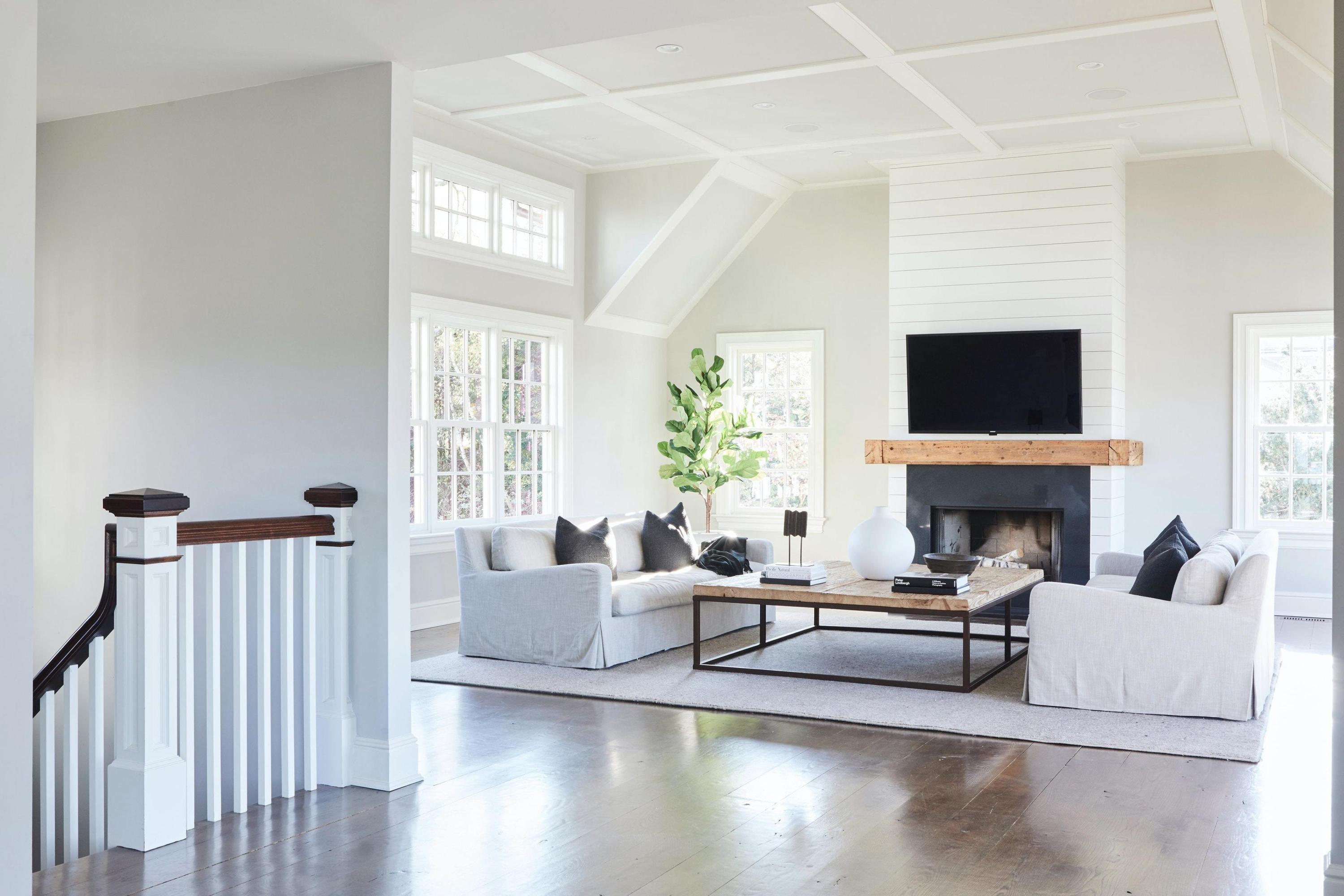 5 N Road Darien, CT 06820 - Photo 13 of 38 a living room with furniture a fireplace and a flat screen tv