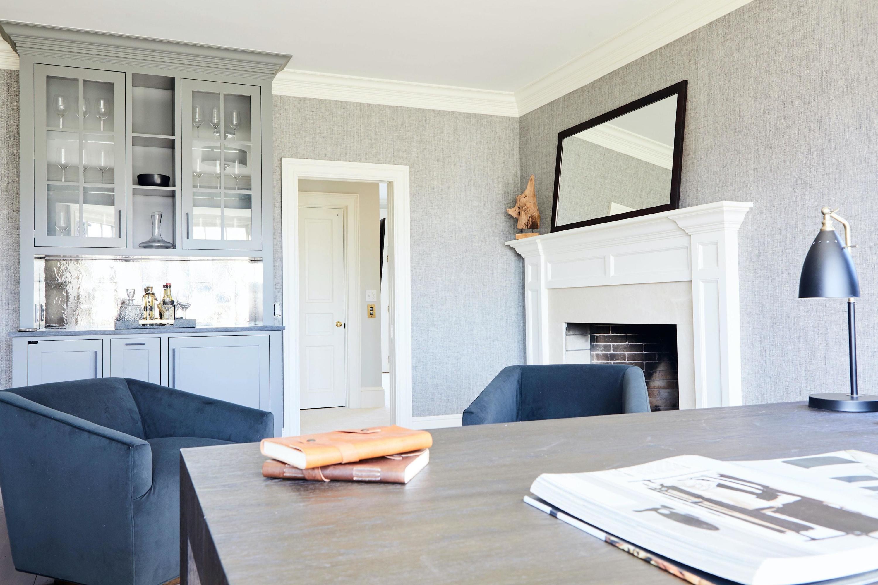 5 N Road Darien, CT 06820 - Photo 18 of 38 a living room with furniture and a fireplace