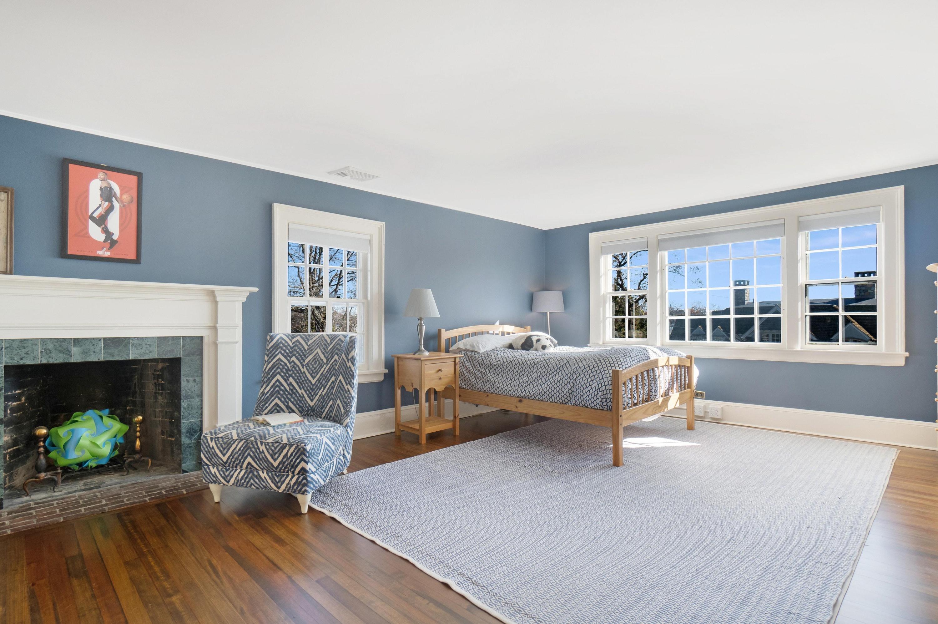 5 N Road Darien, CT 06820 - Photo 28 of 38 a living room with furniture and a fireplace