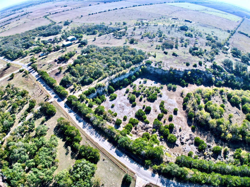 6327 Solana Ranch Road Salado, TX 76571 - Photo 8 of 16 an aerial view of a yard and flowers