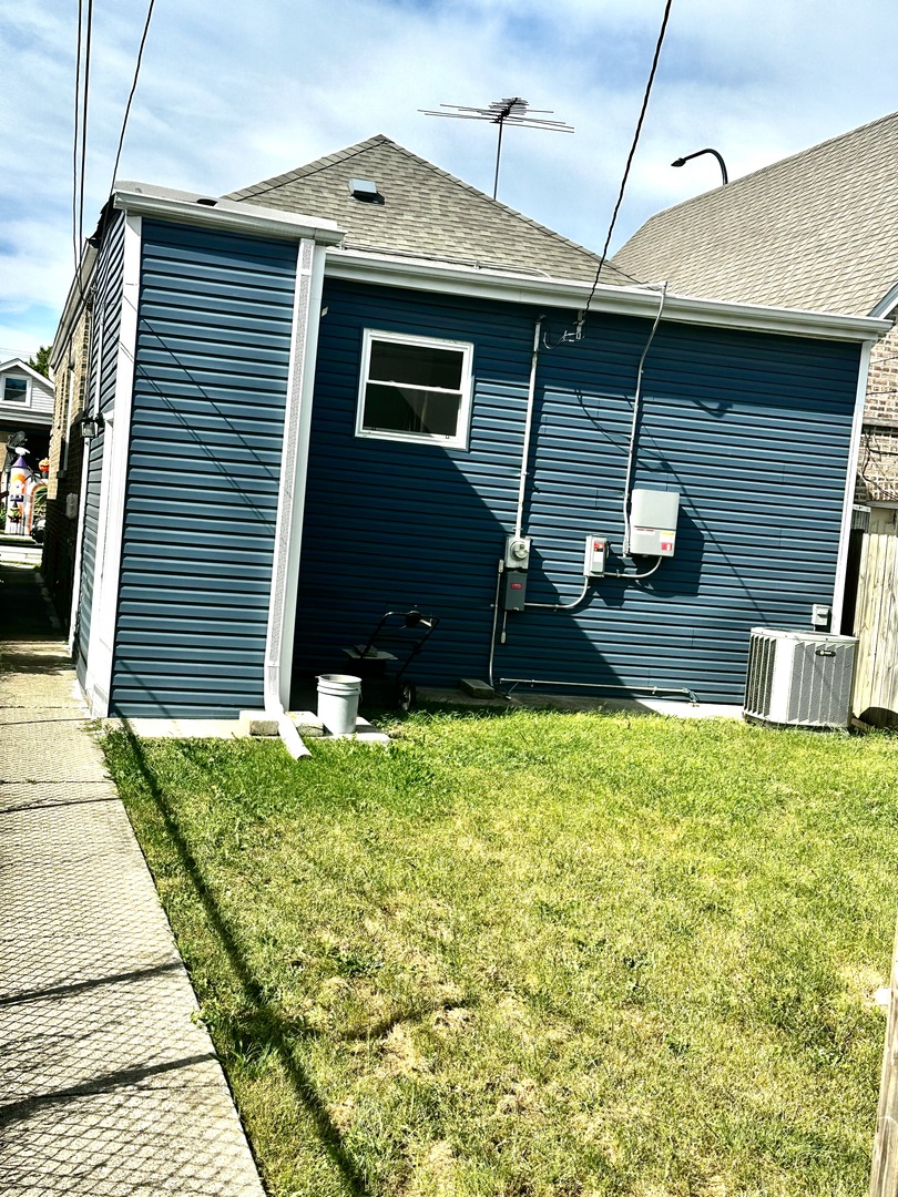 1405 South Central Avenue Cicero, IL 60804 - Photo 21 of 23 a front view of house with yard