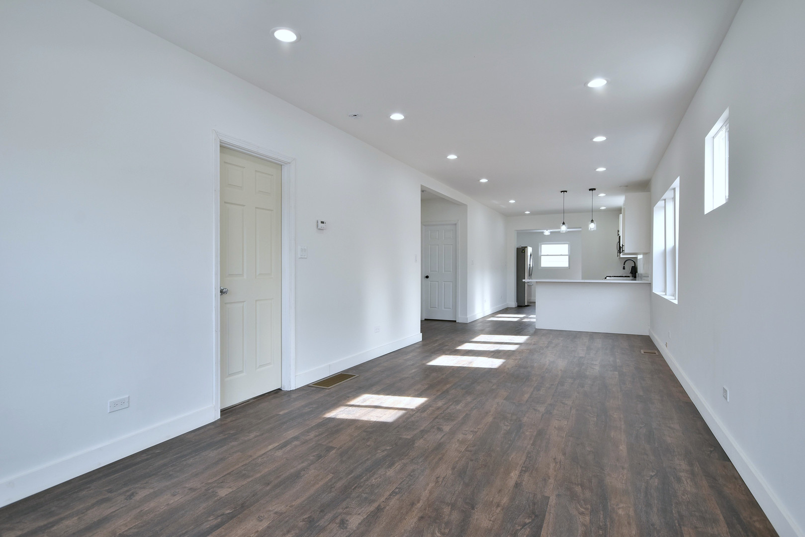 1405 South Central Avenue Cicero, IL 60804 - Photo 5 of 23 a view of empty room with wooden floor