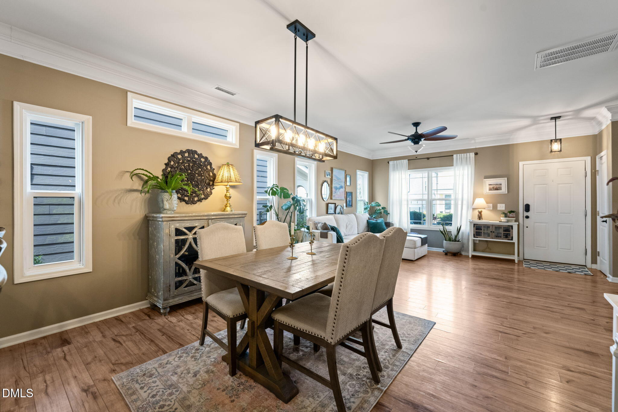 1716 Main Divide Drive Wake Forest, NC 27587 - Photo 9 of 45 a view of a dining room with furniture and window