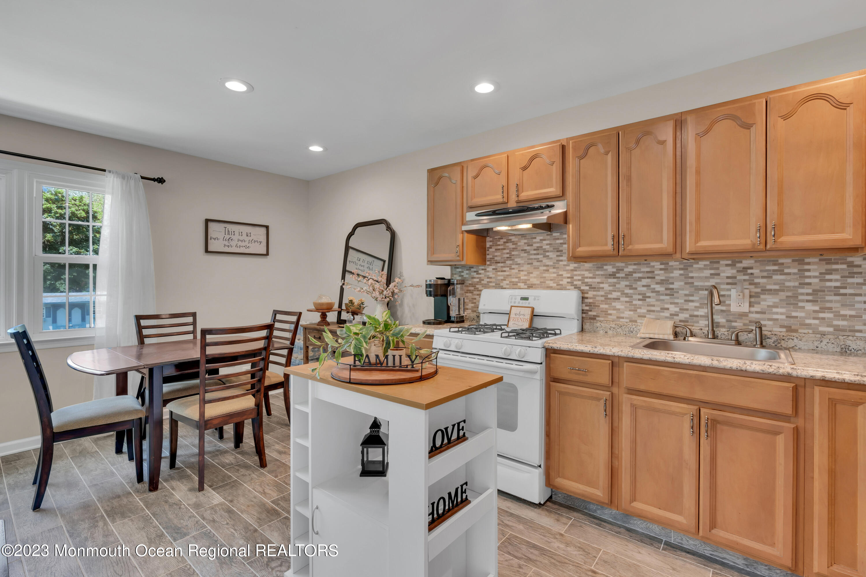 15 Old Scots Road Marlboro, NJ 07746 - Photo 31 of 59 a kitchen with a sink stove and cabinets
