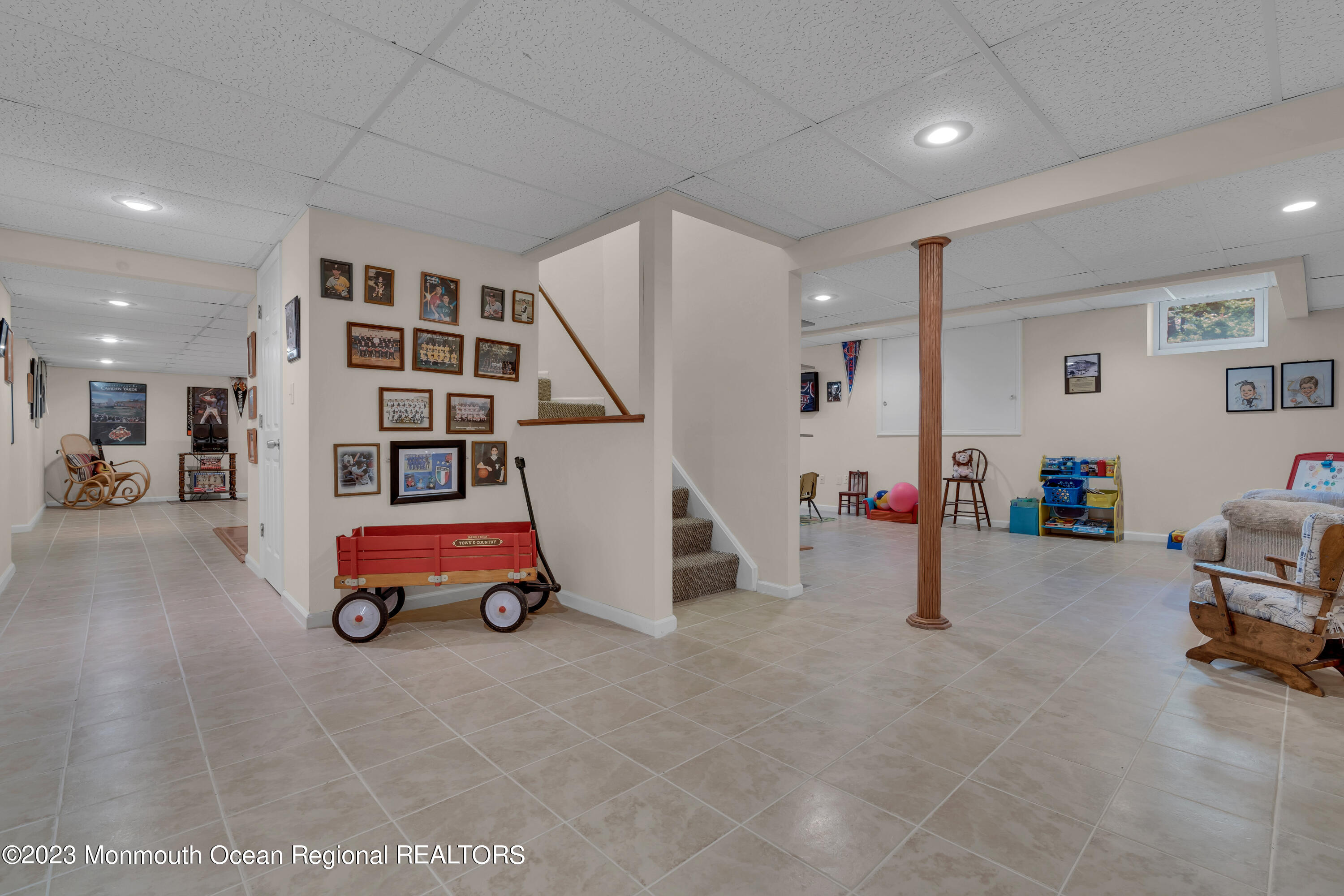 15 Old Scots Road Marlboro, NJ 07746 - Photo 35 of 59 a room with wooden floor and furniture
