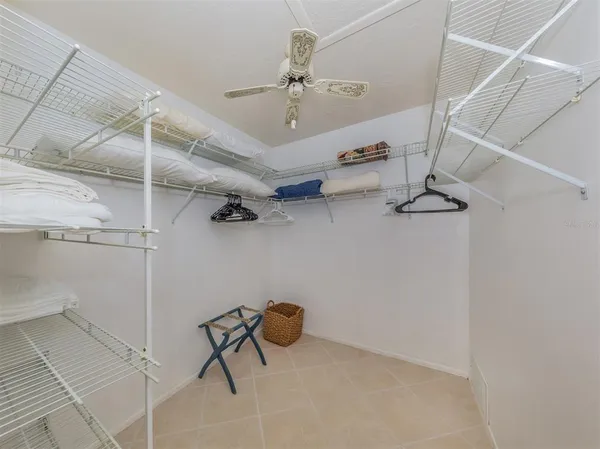 a front view of a house with a garden and a patio