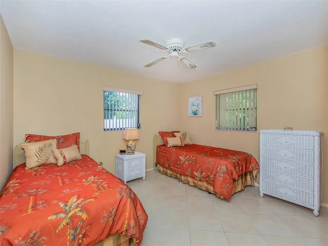 a view of chairs and tables in the patio
