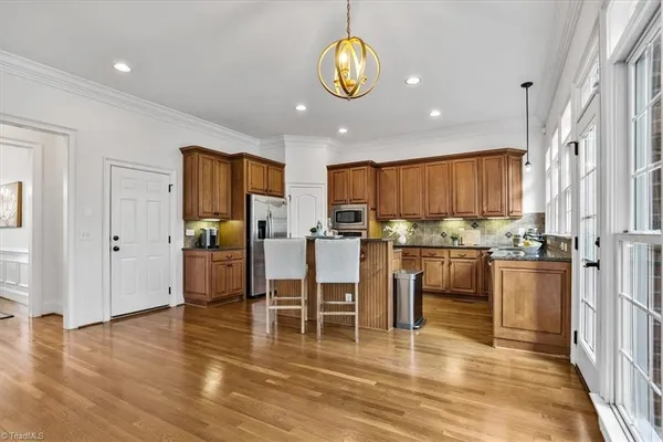 $815,000 | 7626 Henson Forest Drive, Summerfield, NC 27358