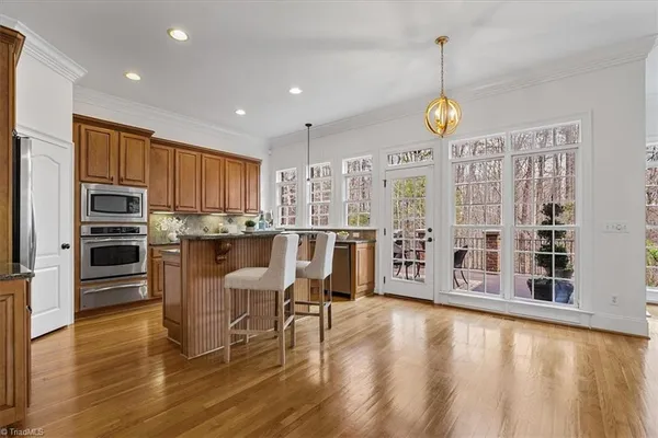 $815,000 | 7626 Henson Forest Drive, Summerfield, NC 27358