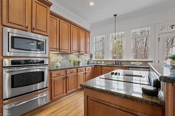 $815,000 | 7626 Henson Forest Drive, Summerfield, NC 27358