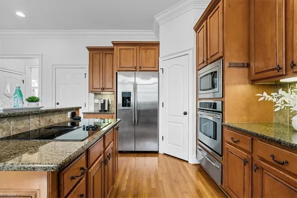 $815,000 | 7626 Henson Forest Drive, Summerfield, NC 27358