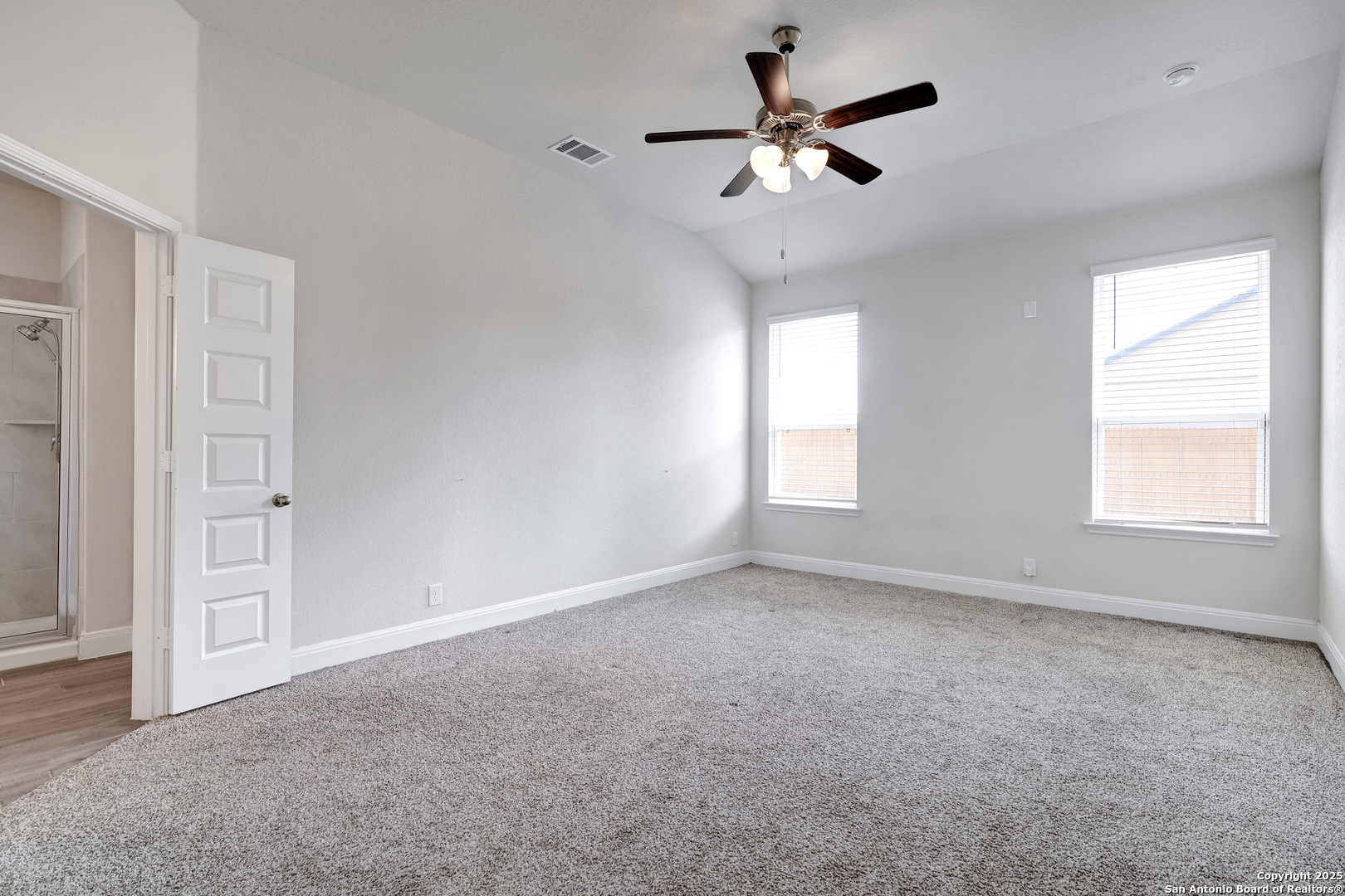 618 Bronze Streme Cibolo, TX 78108 - Photo 13 of 27 wooden floor in an empty room with a window