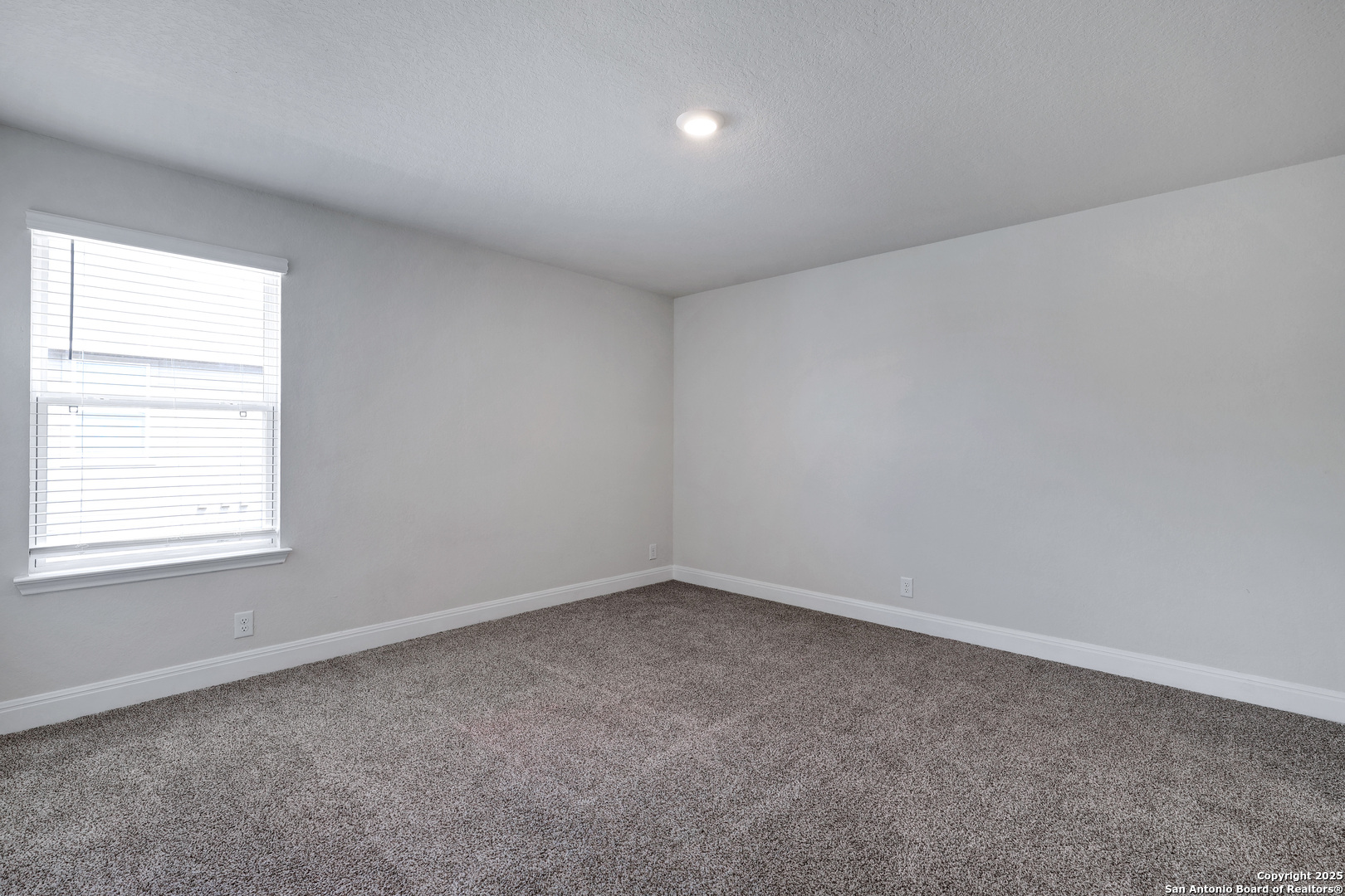 618 Bronze Streme Cibolo, TX 78108 - Photo 23 of 27 an empty room with a window