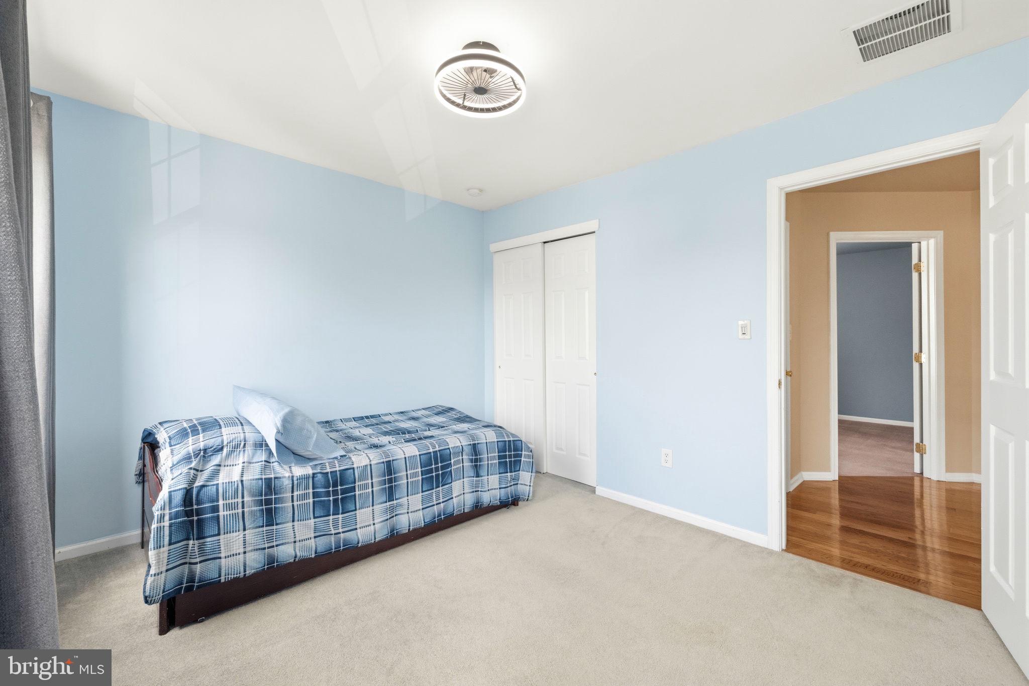 17 Paddock Road Marlton, NJ 08053 - Photo 35 of 54 Serene blue bedroom with cozy charm.