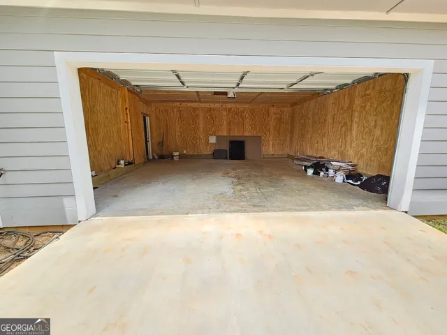 a view of a yard with an outdoor space