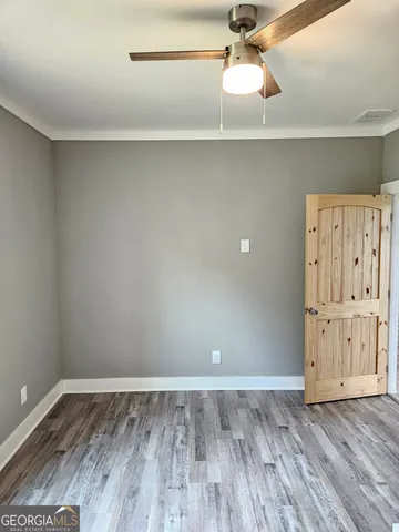 a view of a room with rack on the wall