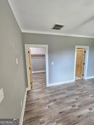 a view of folding clothes and a plant in a kitchen