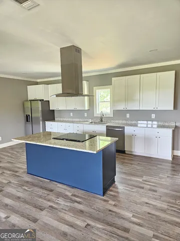 a view of a road with a snow in the background