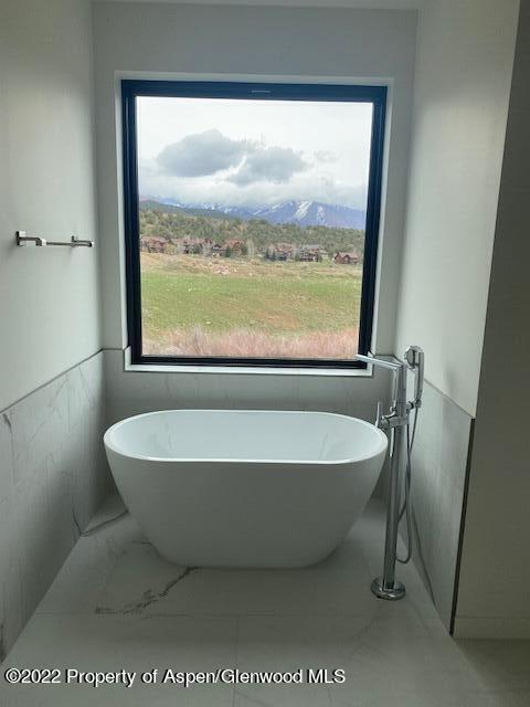 298 Blackhawk Drive New Castle, CO 81647 - Photo 11 of 15 a view of a bathtub in a room