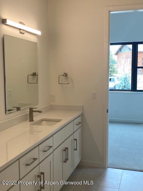 298 Blackhawk Drive New Castle, CO 81647 - Photo 15 of 15 a bathroom with a sink and a mirror