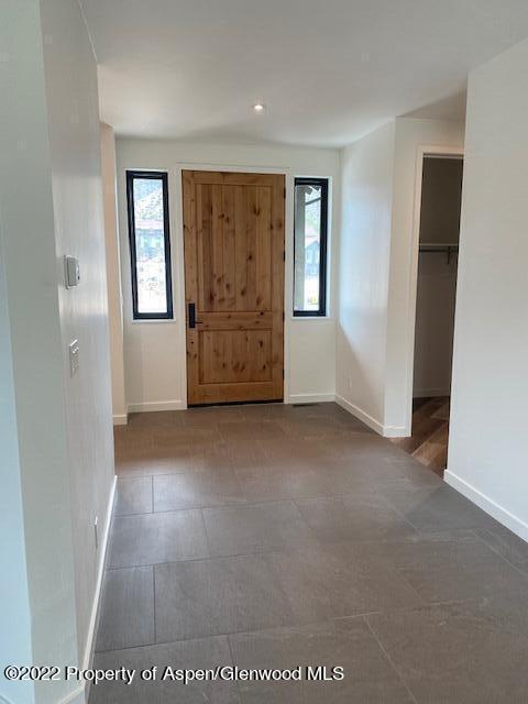 298 Blackhawk Drive New Castle, CO 81647 - Photo 2 of 15 a view of an empty room with a window