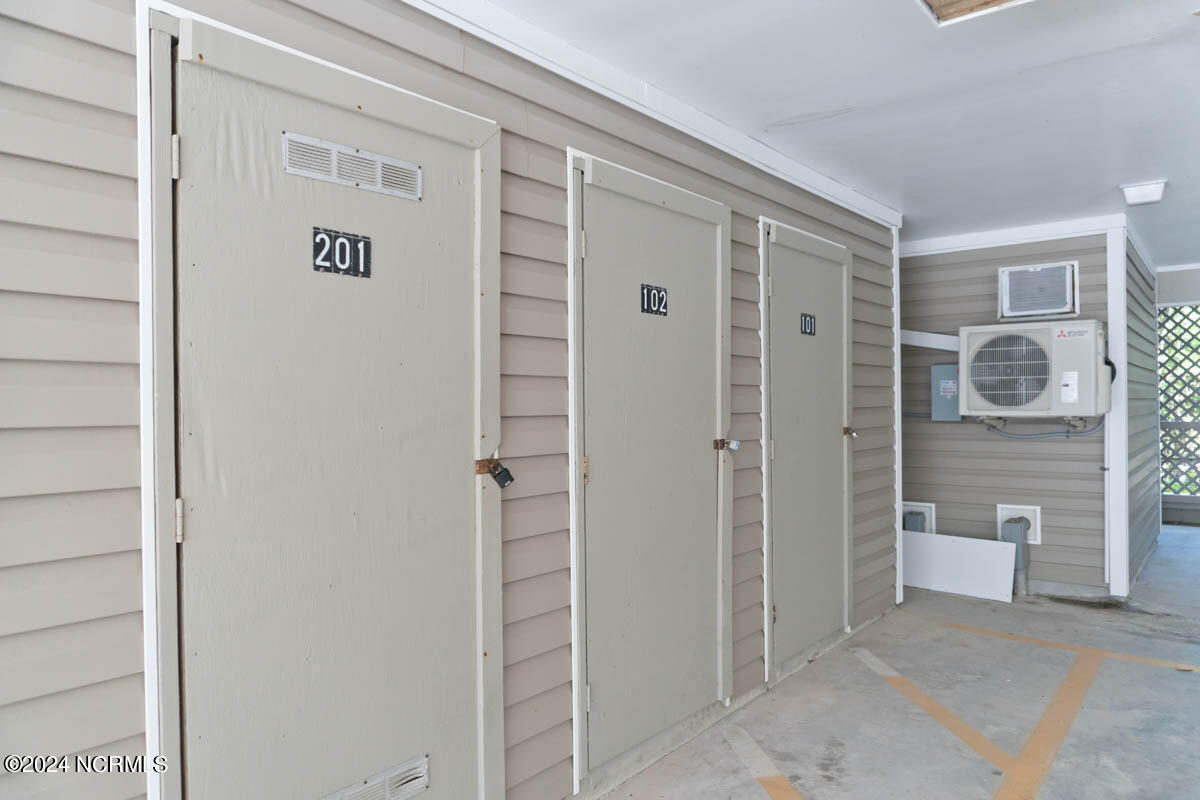1701 Salter Path Road, Unit 201J Indian Beach, NC 28512 - Photo 34 of 54 Ground level storage