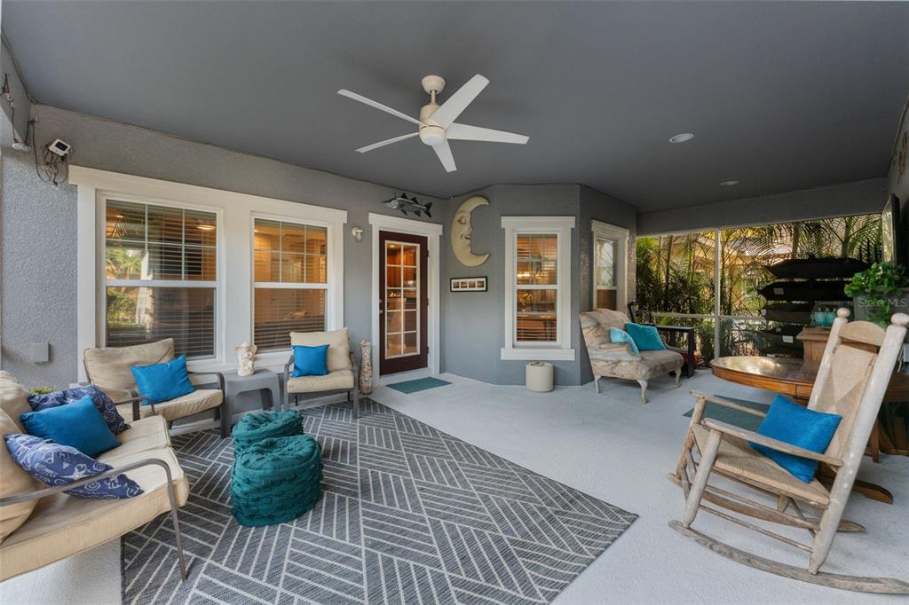 6058 Fishhawk Crossing Boulevard Lithia, FL 33547 - Photo 24 of 47 a living room with furniture and a large window