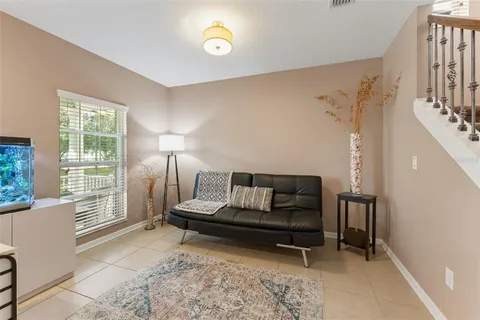 a view of entryway and hall with a front door