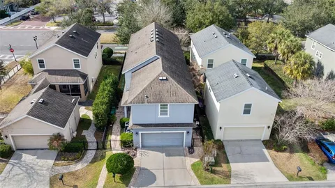 an aerial view of a house with garden