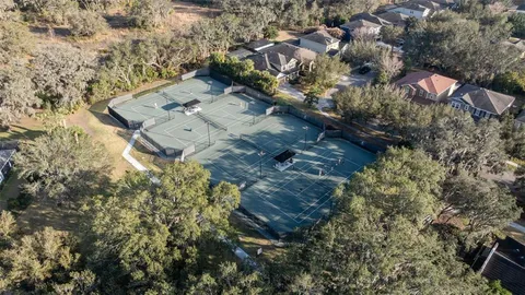 an aerial view of residential house with outdoor space