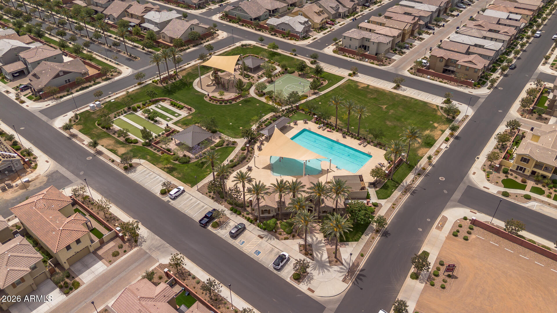 4245 East Jesse Street Gilbert, AZ 85295 - Photo 28 of 45 an aerial view of a residential building with an outdoor space