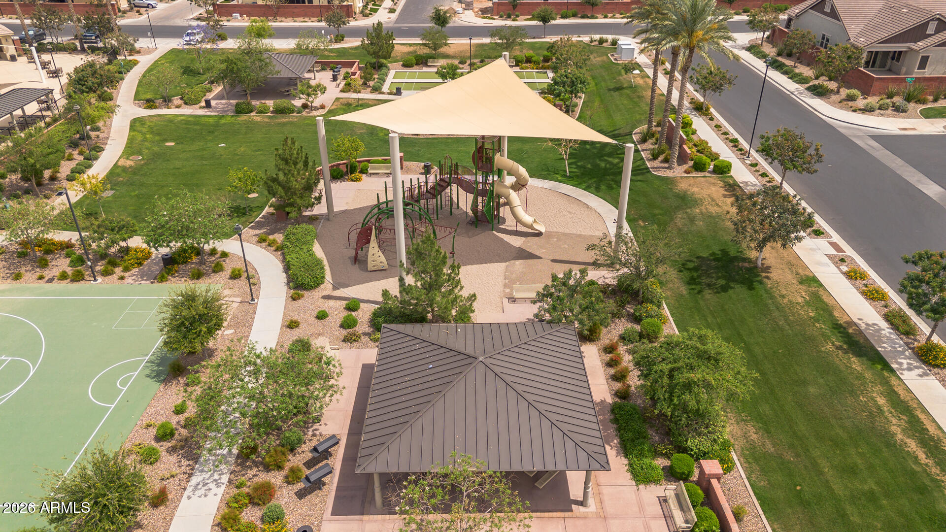 4245 East Jesse Street Gilbert, AZ 85295 - Photo 35 of 45 an aerial view of residential houses with outdoor space