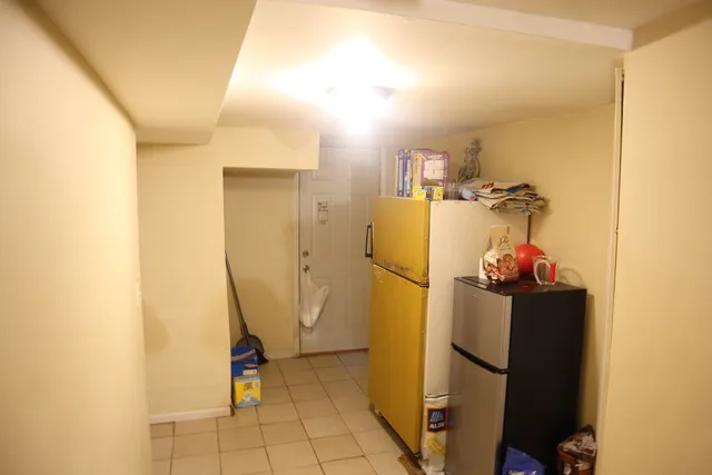 a view of a storage & utility room with utility room