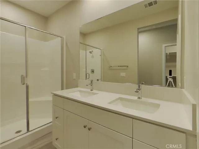 a view of an empty room and closet