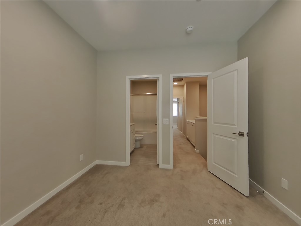 24935 Vermijo Court Wildomar, CA 92595 - Photo 8 of 26 a view of an empty room and closet