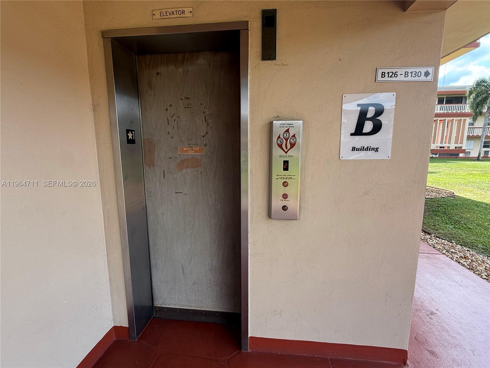 5300 Washington Street, Unit B329 Hollywood, FL 33021 - Photo 19 of 20 a view of a hallway with front door