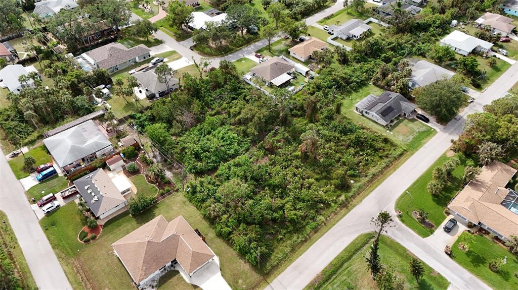 3112 Cypress Road Venice, FL 34293 - Photo 1 of 5 an aerial view of multiple houses with yard