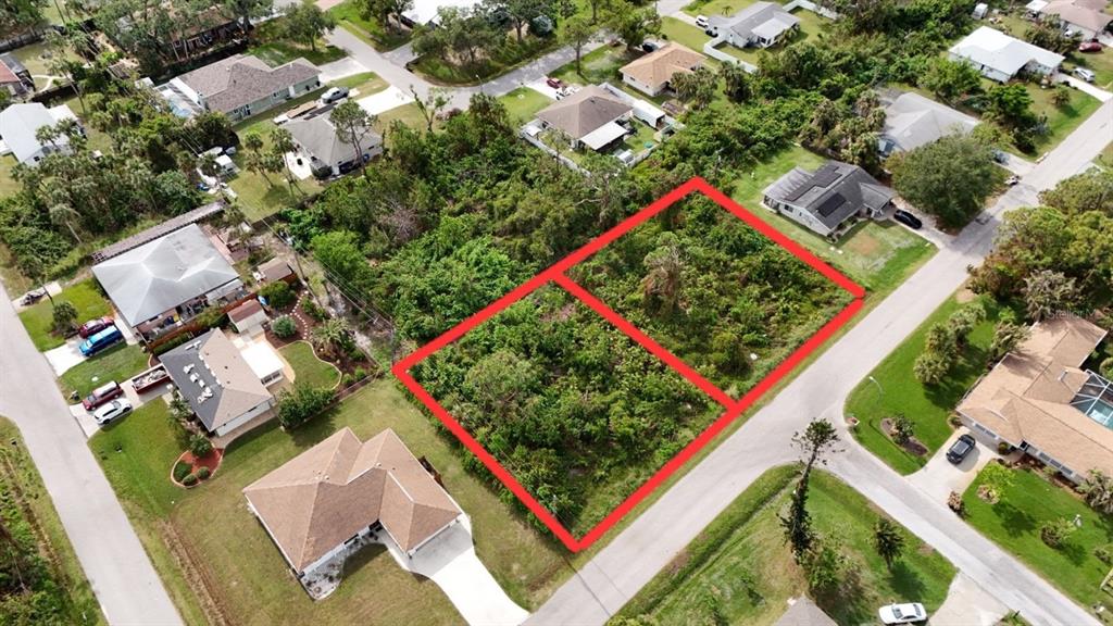 3112 Cypress Road Venice, FL 34293 - Photo 2 of 5 an aerial view of a residential houses with city street