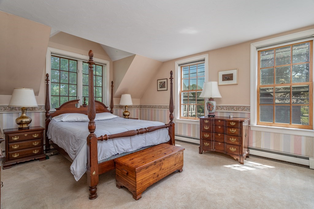 5 Lancaster Road Shirley, MA 01464 - Photo 16 of 42 a bedroom with a bed and a window