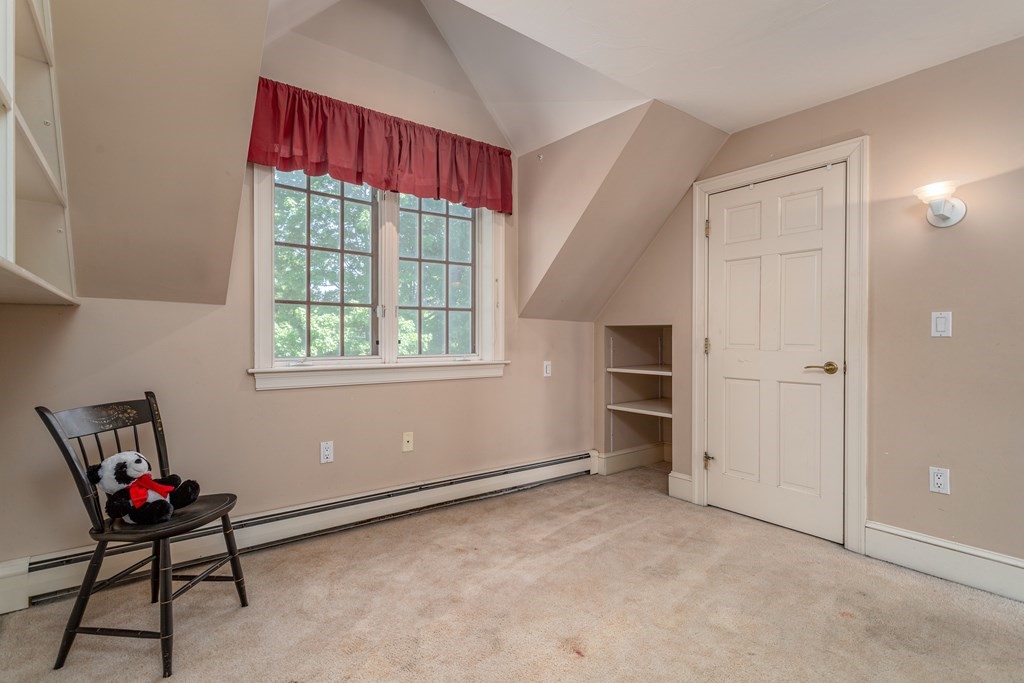 5 Lancaster Road Shirley, MA 01464 - Photo 21 of 42 a living room with furniture and a window