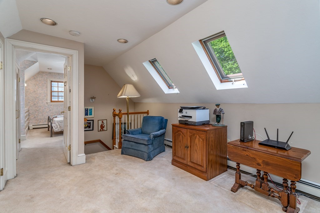 5 Lancaster Road Shirley, MA 01464 - Photo 22 of 42 a living room with furniture