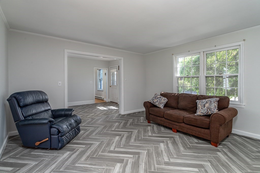 5 Lancaster Road Shirley, MA 01464 - Photo 31 of 42 a living room with furniture and a window