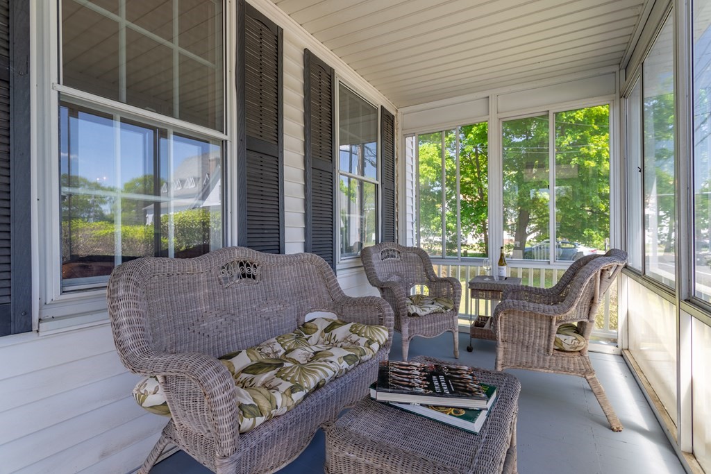 5 Lancaster Road Shirley, MA 01464 - Photo 35 of 42 a living room with furniture and a floor to ceiling window