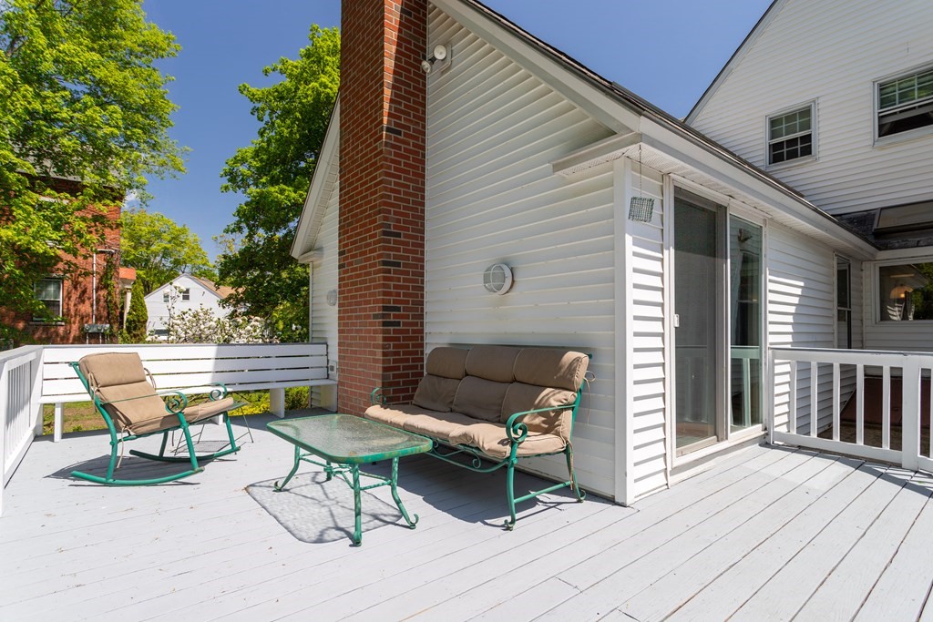 5 Lancaster Road Shirley, MA 01464 - Photo 37 of 42 a backyard of a house with table and chairs