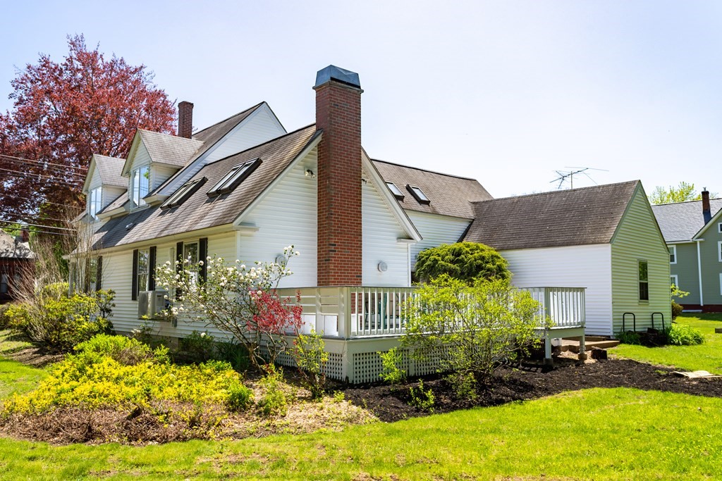 5 Lancaster Road Shirley, MA 01464 - Photo 41 of 42 a front view of a house with a yard