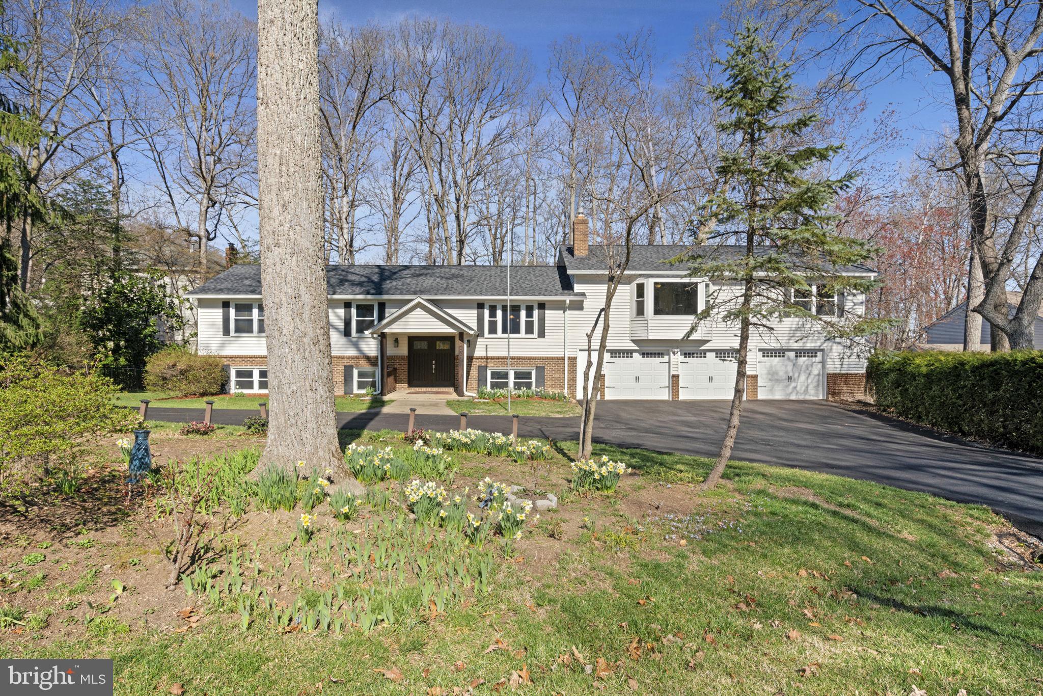 18607 Cabin Road Triangle, VA 22172 - Photo 1 of 64 a house with trees in front of it