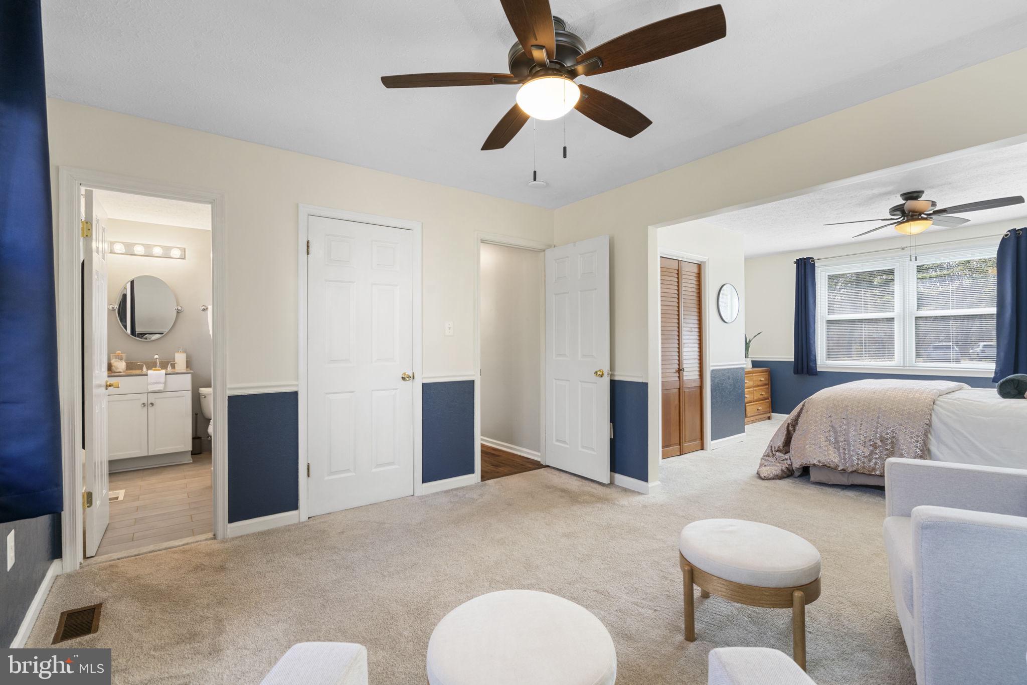18607 Cabin Road Triangle, VA 22172 - Photo 27 of 64 a living room with furniture and a large window