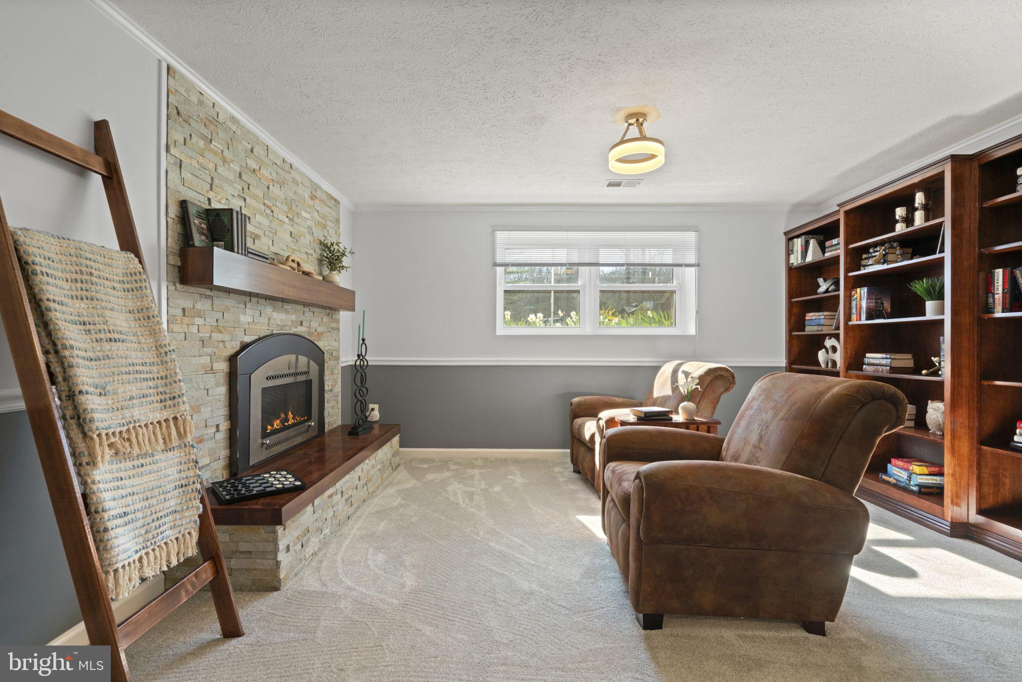 18607 Cabin Road Triangle, VA 22172 - Photo 36 of 64 a living room with furniture and a window