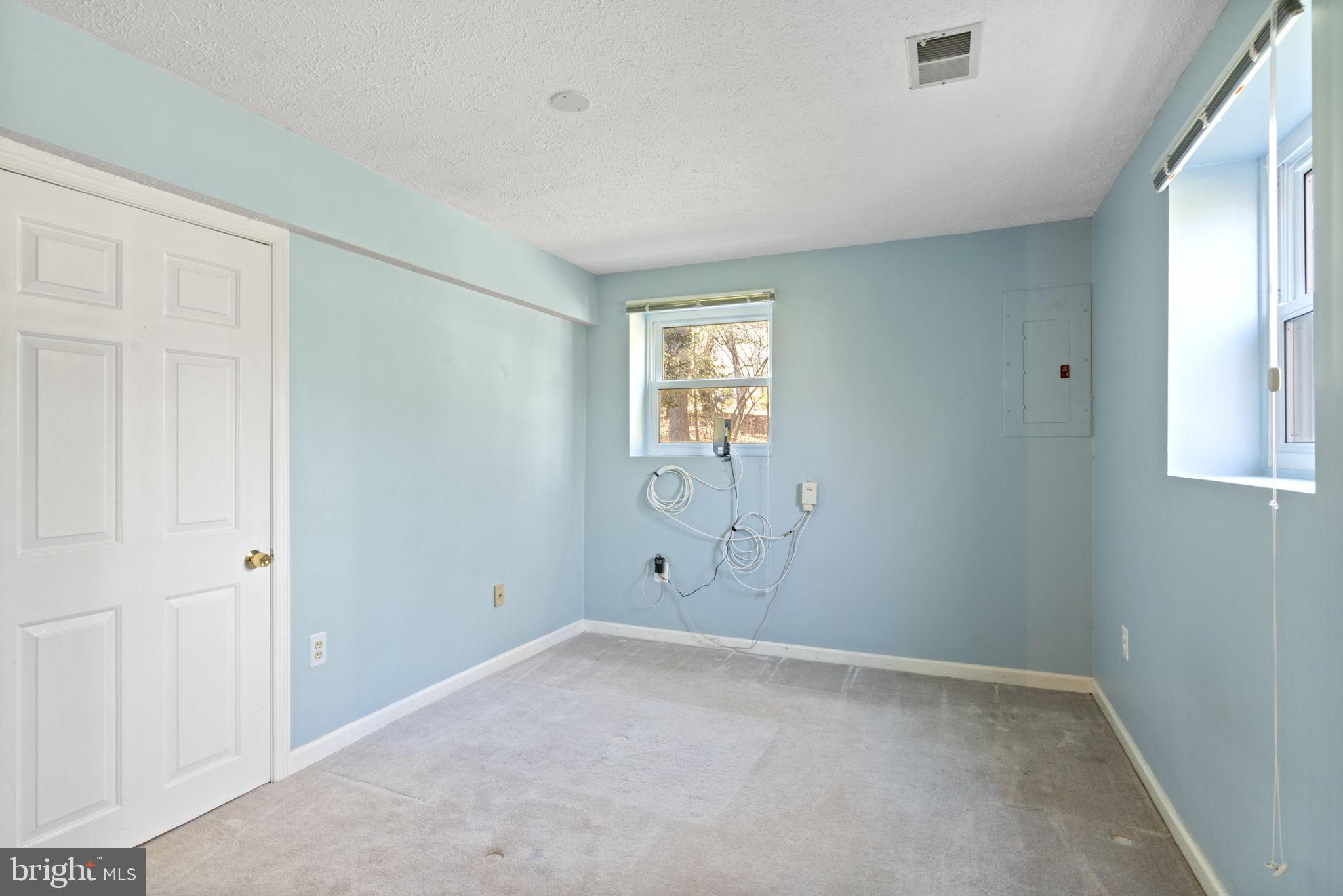 18607 Cabin Road Triangle, VA 22172 - Photo 46 of 64 a view of an empty room with a window