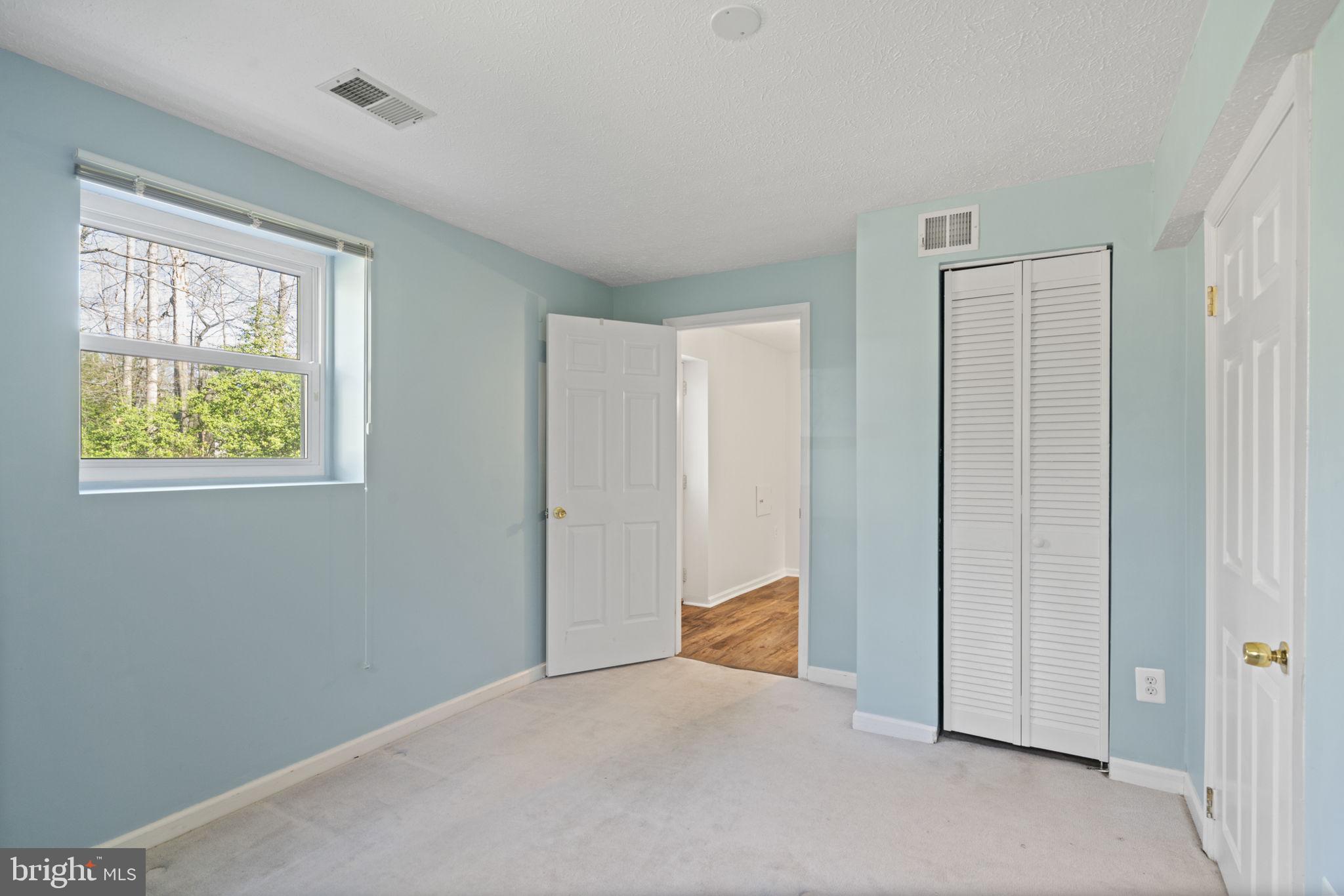 18607 Cabin Road Triangle, VA 22172 - Photo 47 of 64 a view of an empty room with a window
